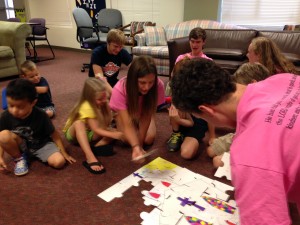 Youth and children work together to "build the church"